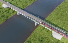 Wizualizacja mostu kolejowego w Obornikach z jadącym pociągiem_fot.PLK