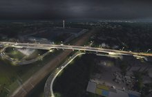 Wizualizacja komputerowa wiaduktu drogowego nad szlakiem kolejowym. Widok z lotu ptaka.