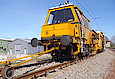 Podbijarka torowa marki Plasser & Theurer MD 07-32. Maszyna podbija i reguluje położenie torów kolejowych.