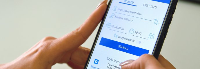 Telefon z zaprezentowaną aplikacją Portal Pasażera
